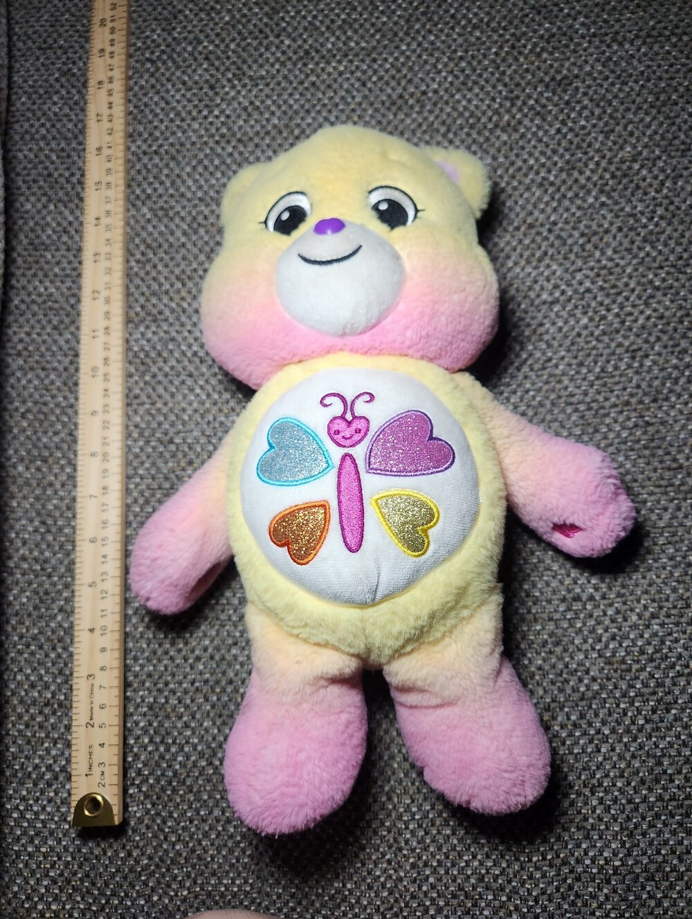 Care Bears Calming Heart Bear is a 14-inch plush toy